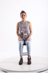 Sitting photo references of Molly blue jeans womna singlet